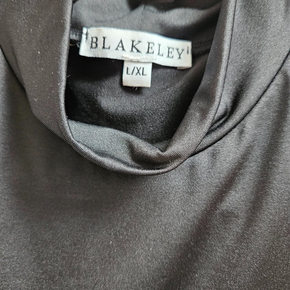 Black mock neck bodysuit by Blakely